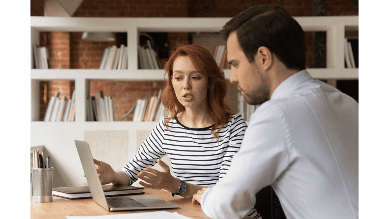 man and woman on laptop